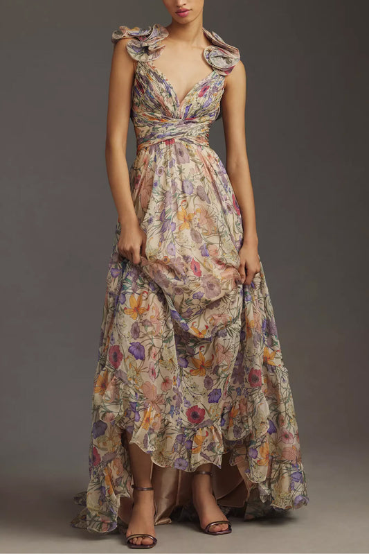 Vestido largo floral plisado con espalda descubierta y cordones 