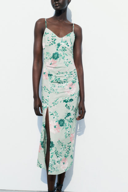 Vestido midi sin mangas con abertura floral 