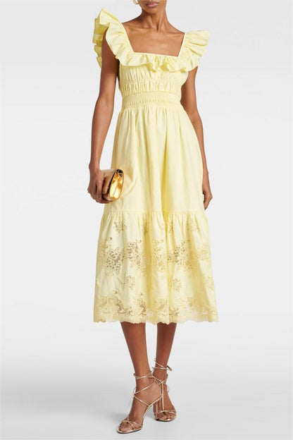 Vestido midi sin mangas con volantes y encaje bordado 