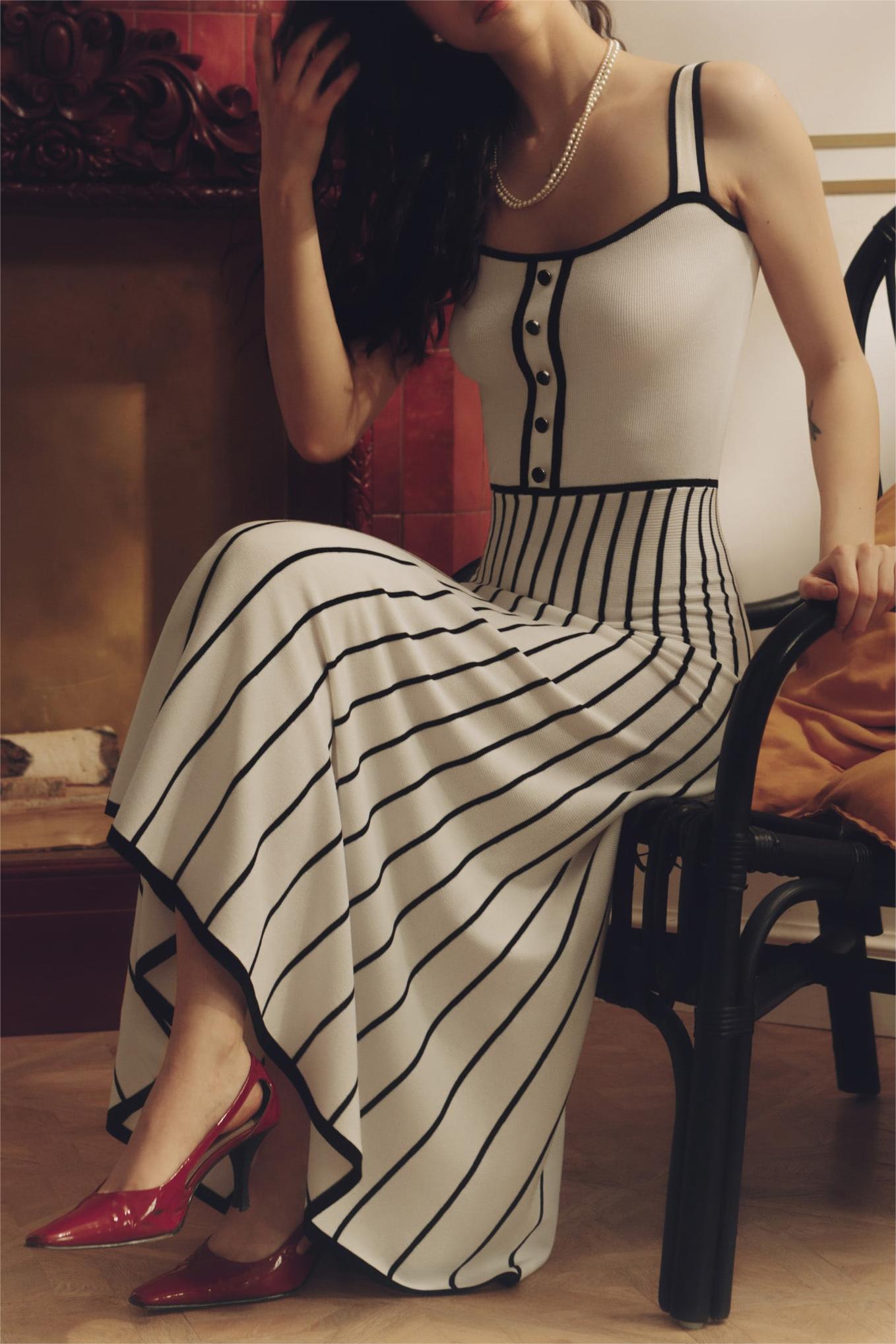 Vestido midi sin mangas de rayas de jersey 