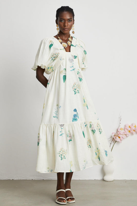 Vestido midi fruncido con mangas abullonadas y estampado floral 