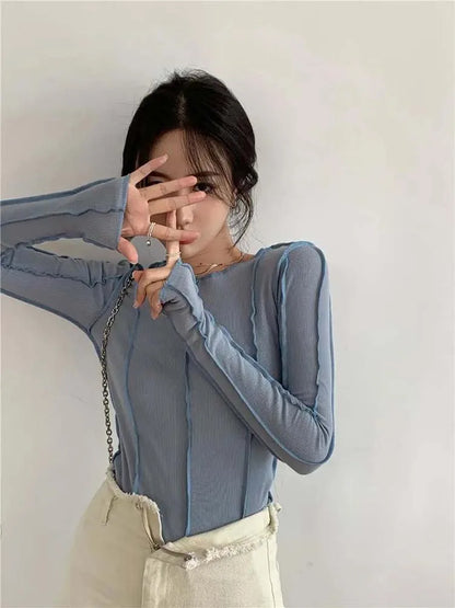 Camisetas de manga larga para mujer, de primavera, lisas, con cuello redondo, elegantes, con decoración de líneas brillantes, ajustadas, informales, suaves, de alta calidad.