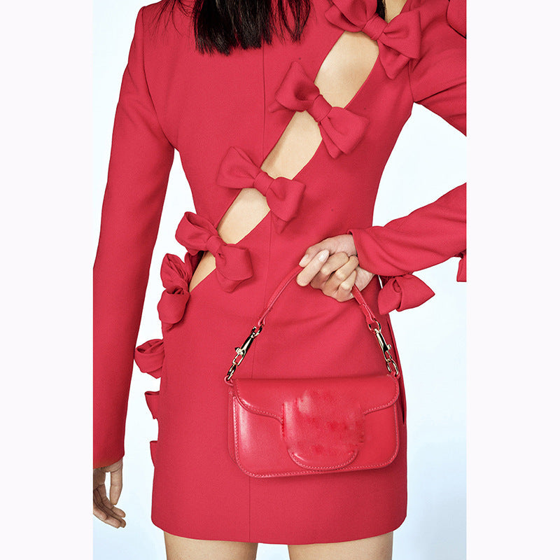 Vestido pequeño asimétrico con lazo y aberturas, con personalidad de estrella de principios de otoño