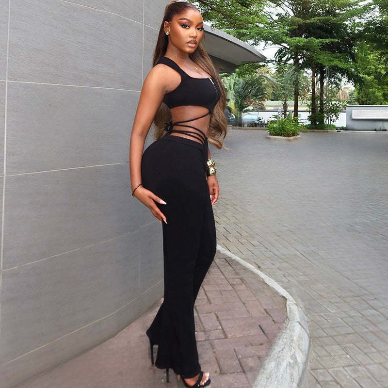 Conjunto de top negro sexy sin mangas con cintura alta y pantalones deportivos ajustados para mujer
