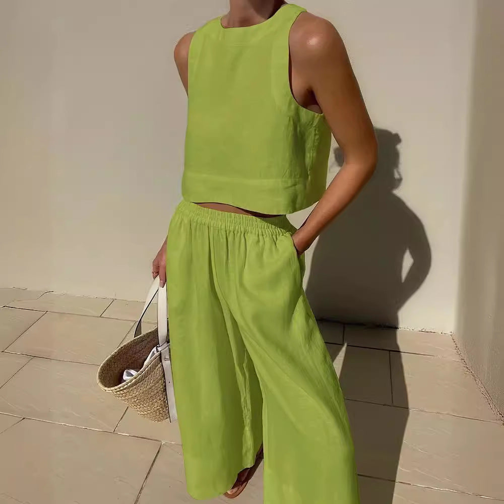 Conjunto de dos piezas de camisa y pantalones holgados de color liso sin mangas y estilo casual de talla grande