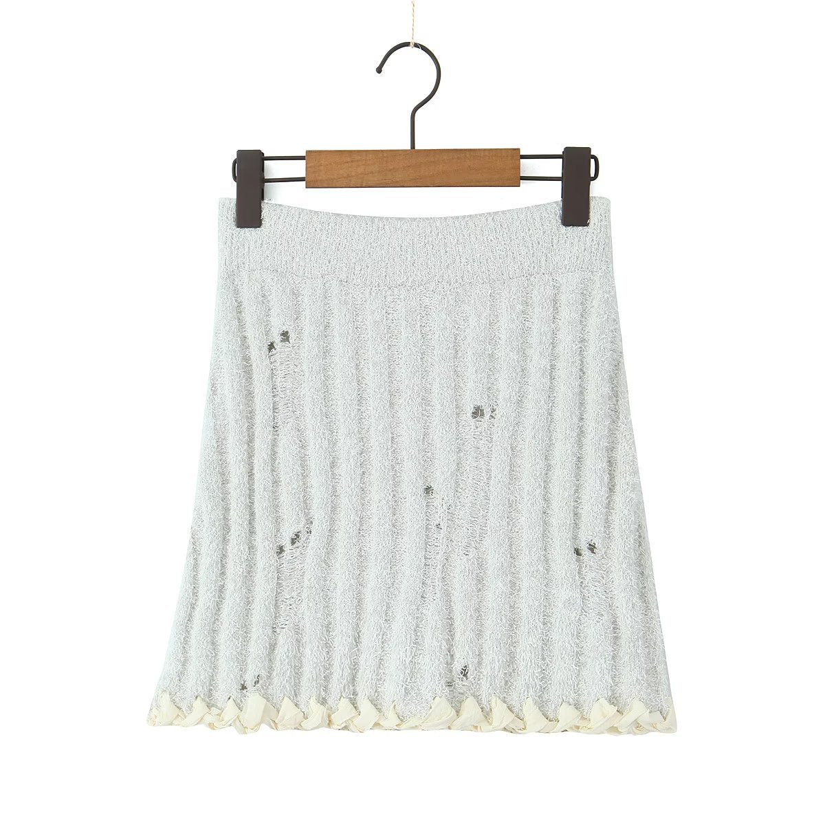 Conjunto de suéter de punto con cuello grande y cuerda hecha a mano en dos colores de otoño