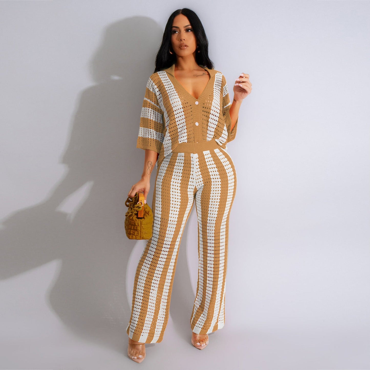 Conjunto de blusa y pantalones anchos de punto con cuello en V y rayas caladas para mujer