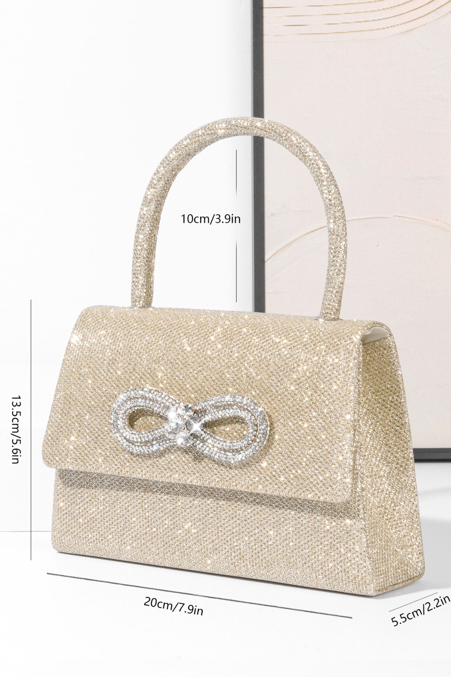 Bolso con asa de diamante y brillo metálico 