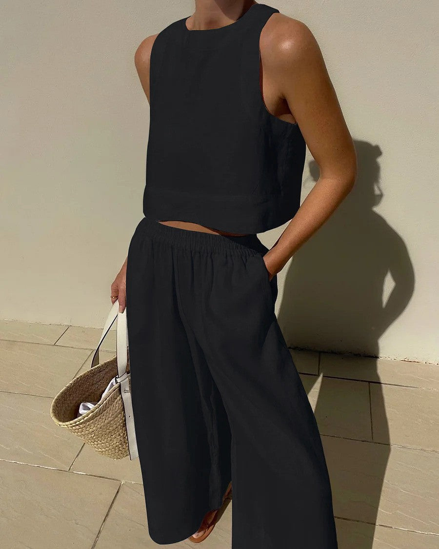 Conjunto de dos piezas de camisa y pantalones holgados de color liso sin mangas y estilo casual de talla grande