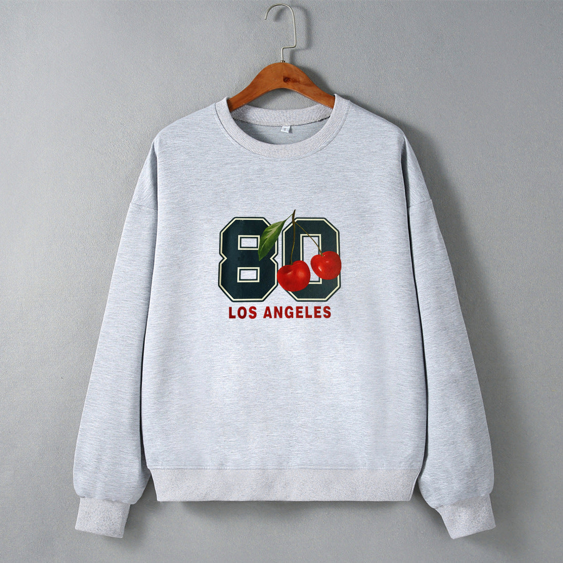 Sudadera holgada de manga larga con cuello redondo y hombros descubiertos para mujer, estilo hipster urbano, ropa informal para otoño e invierno.