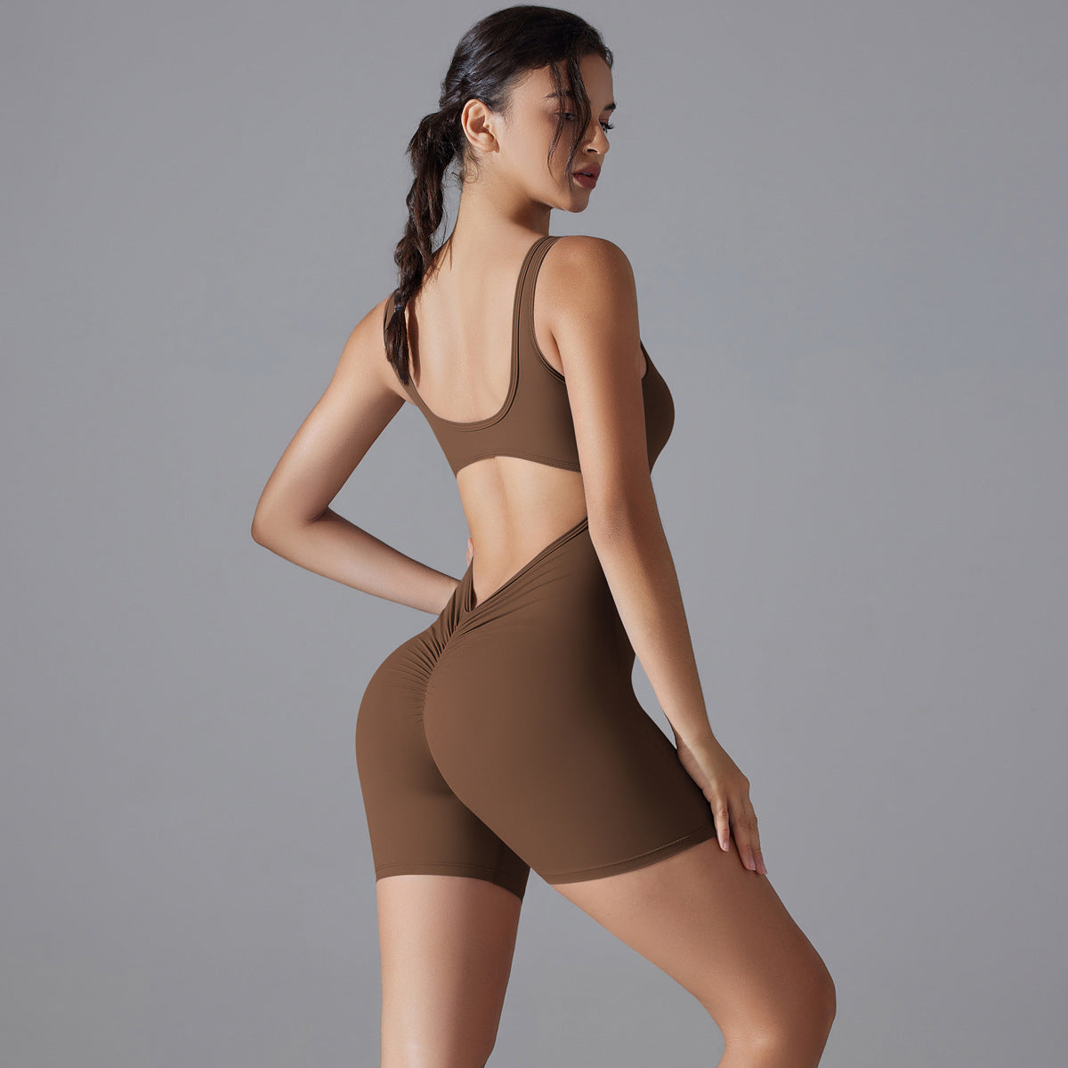 Mono de yoga sexy con escote en V y cintura alta para mujer, mono deportivo ajustado de una pieza que moldea la espalda y contrae el abdomen.
