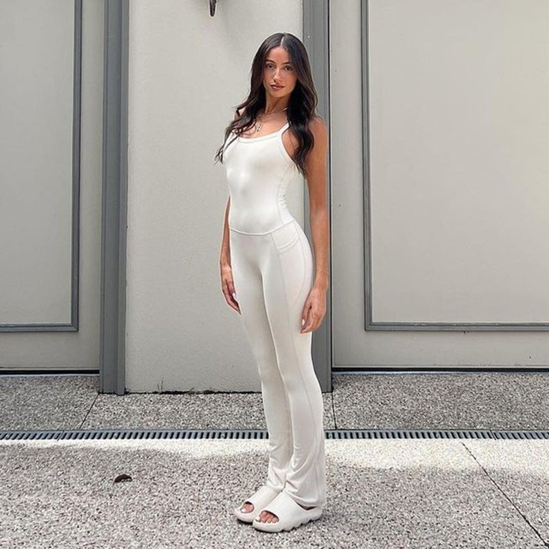 Pantalones deportivos de una pieza con bolsillos, color liso y costuras sencillas para yoga y estilo casual.