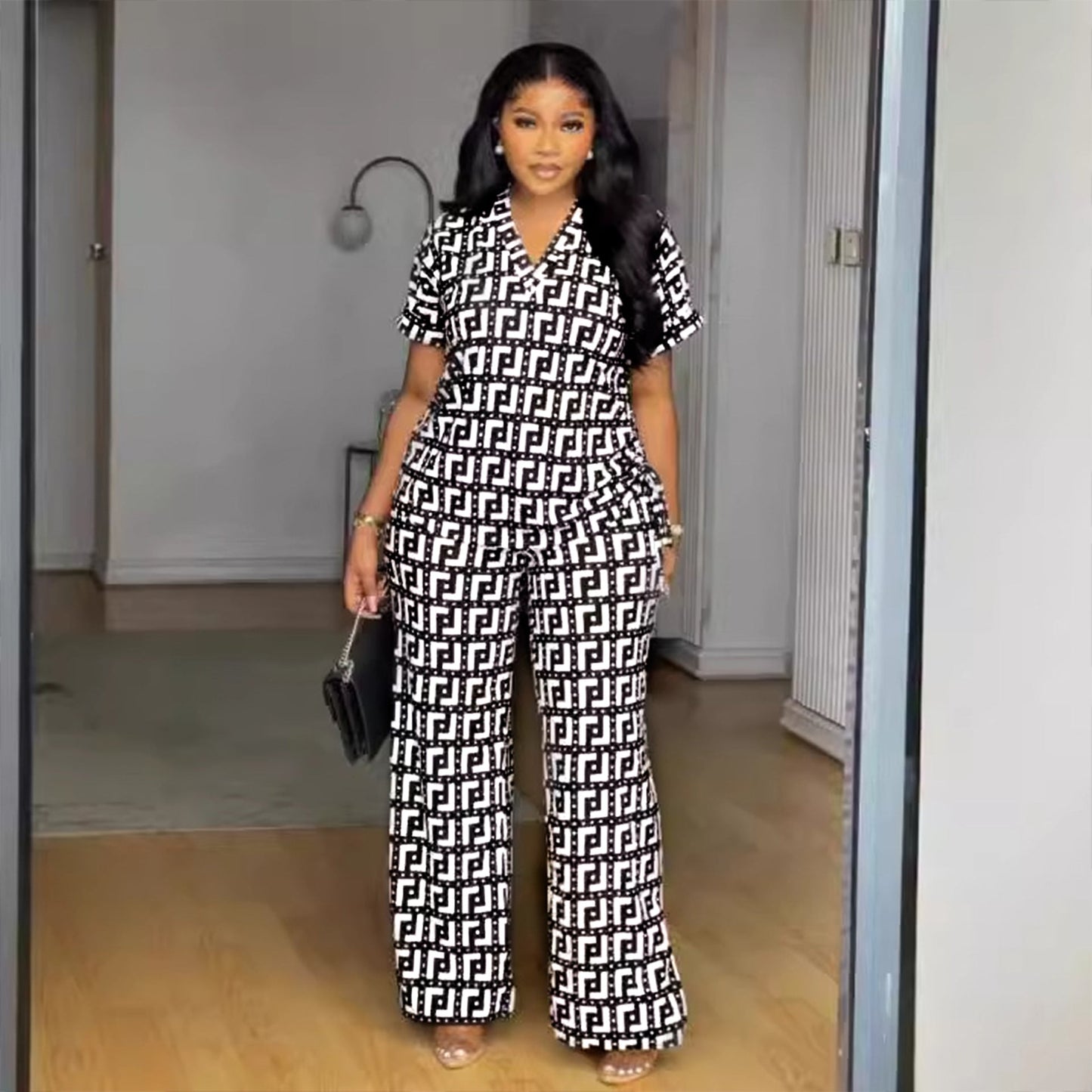 Conjunto de dos piezas de pantalones anchos plisados con cuello en V y estampado para mujer