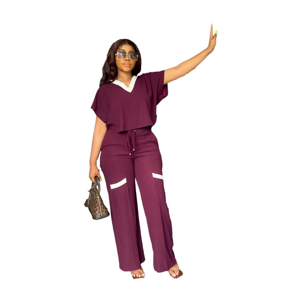 Conjunto deportivo de dos piezas de camiseta de manga corta informal de color liso con pantalones de pierna recta para verano