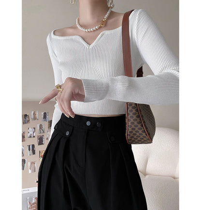 Suéter corto con cuello de pétalo para mujer, camisa de otoño ajustada con clavícula.