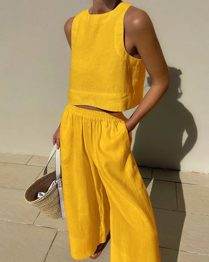 Conjunto de dos piezas de camisa y pantalones holgados de color liso sin mangas y estilo casual de talla grande