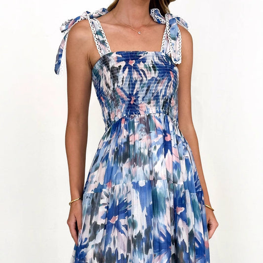 Vestido largo holgado con estampado floral, cintura elástica y tirantes anudados para primavera y verano