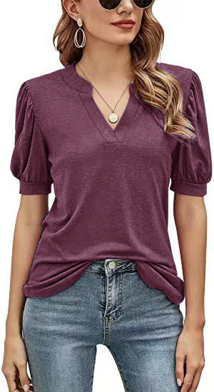 Camiseta holgada informal de verano con cuello en V y mangas abullonadas de color liso para mujer