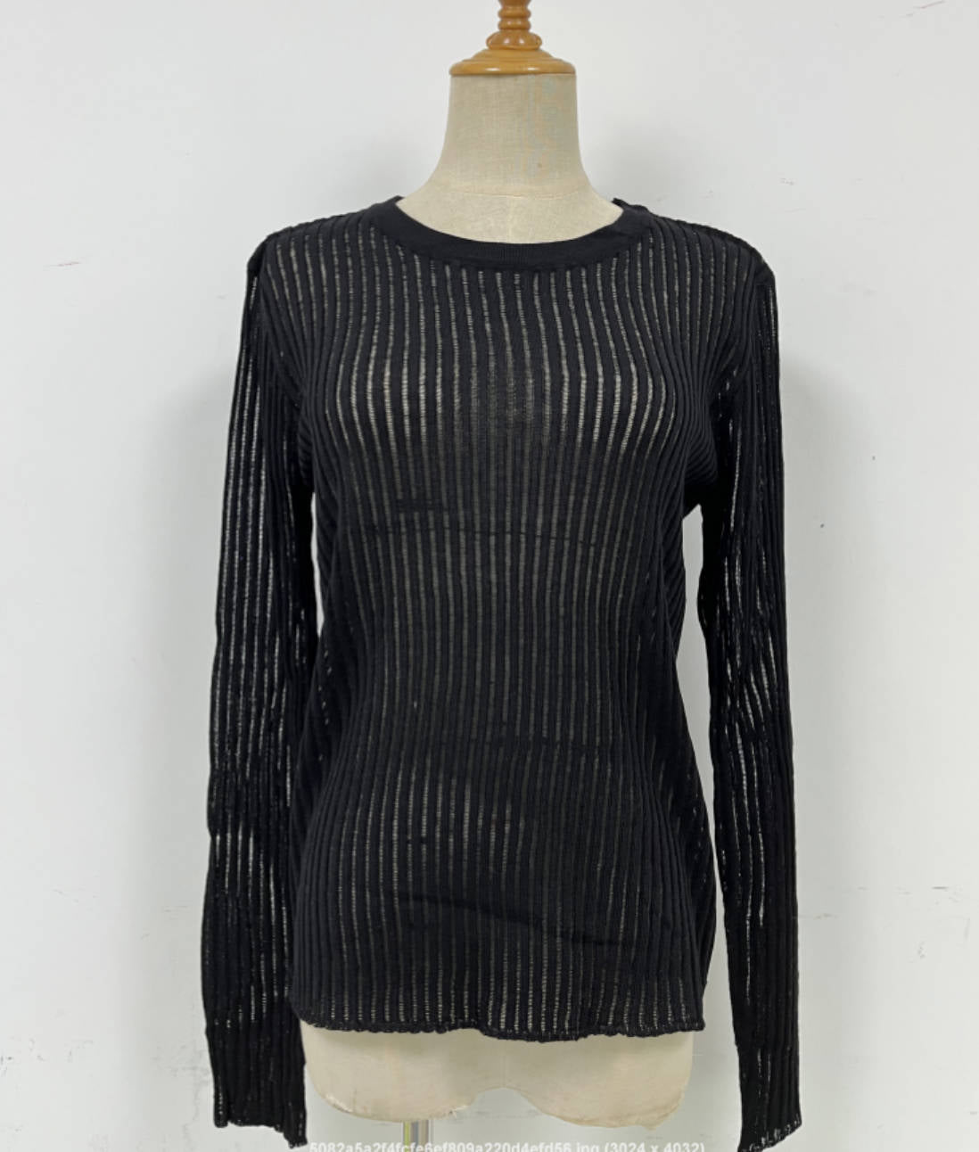 Top de lana de punto fino y transpirable con cuello redondo y manga larga para primavera y verano