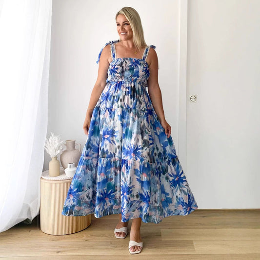 Vestido largo holgado con estampado floral, cintura elástica y tirantes anudados para primavera y verano