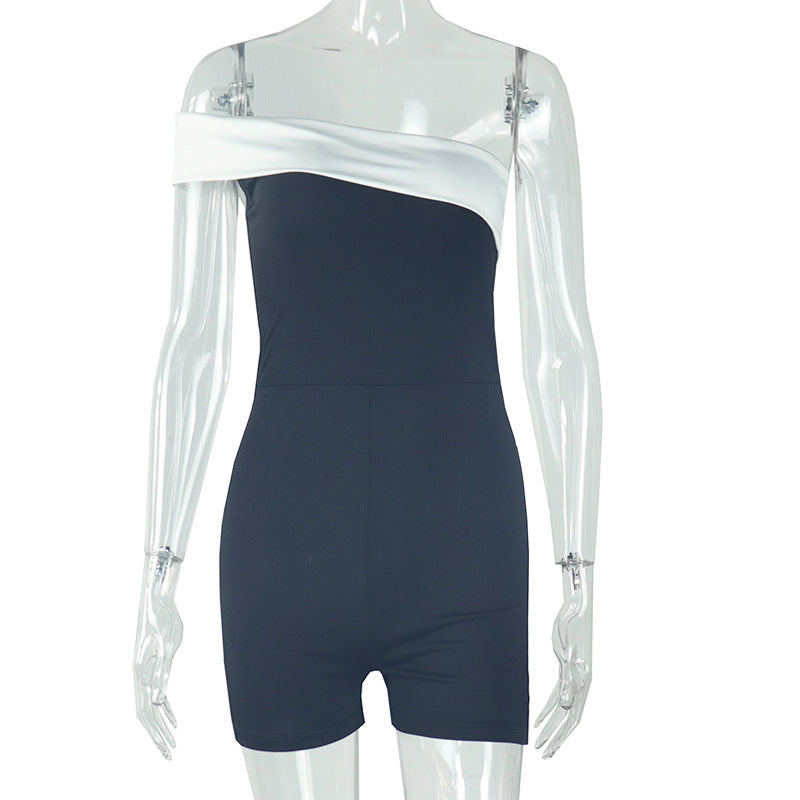 Mono elegante para mujer con top de tubo ajustado en contraste de color blanco y negro, mono con hombros descubiertos y mangas raglán