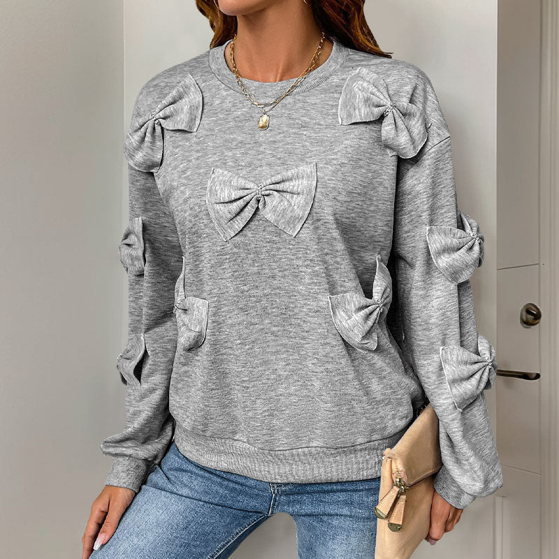 Sudadera informal de otoño con cuello redondo y costuras de lazo en gris