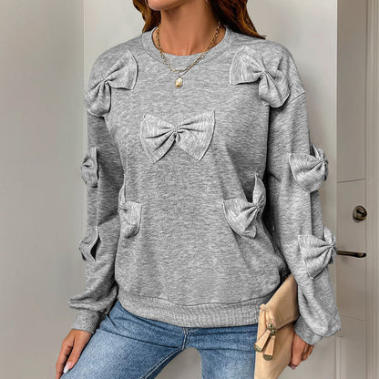 Sudadera informal de otoño con cuello redondo y costuras de lazo en gris
