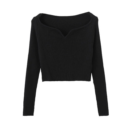 Suéter corto con cuello de pétalo para mujer, camisa de otoño ajustada con clavícula.