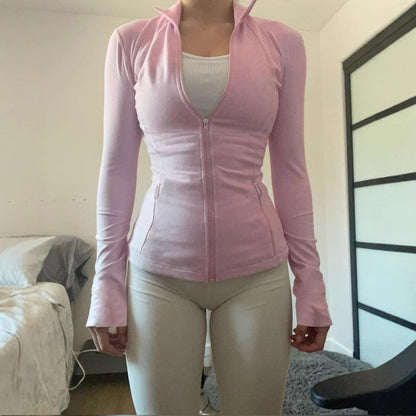 Camiseta deportiva de color liso para correr, fitness, yoga, ajustada, para otoño e invierno, con capucha y cremallera para mujer