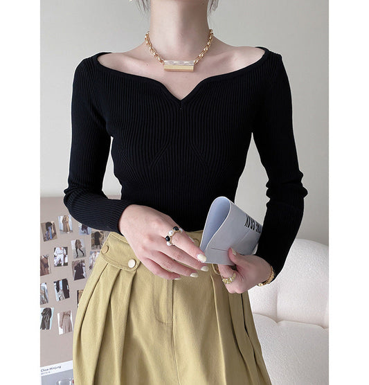 Suéter corto con cuello de pétalo para mujer, camisa de otoño ajustada con clavícula.