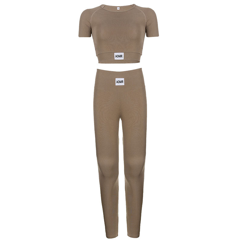 Conjunto de dos piezas de yoga deportivo con cuello redondo, manga larga, pantalones ajustados de cintura alta y estampado de letras en color liso Zhang Zi