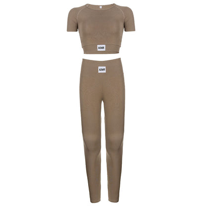 Conjunto de dos piezas de yoga deportivo con cuello redondo, manga larga, pantalones ajustados de cintura alta y estampado de letras en color liso Zhang Zi