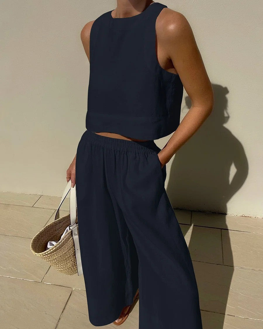 Conjunto de dos piezas de camisa y pantalones holgados de color liso sin mangas y estilo casual de talla grande
