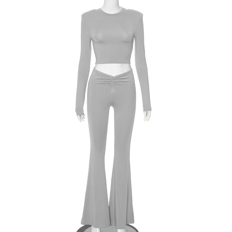 Conjunto de pantalones y blusa de cintura alta con hombros acolchados y manga larga para mujer