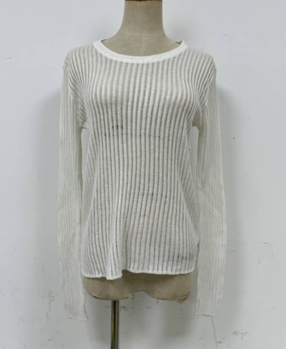 Top de lana de punto fino y transpirable con cuello redondo y manga larga para primavera y verano
