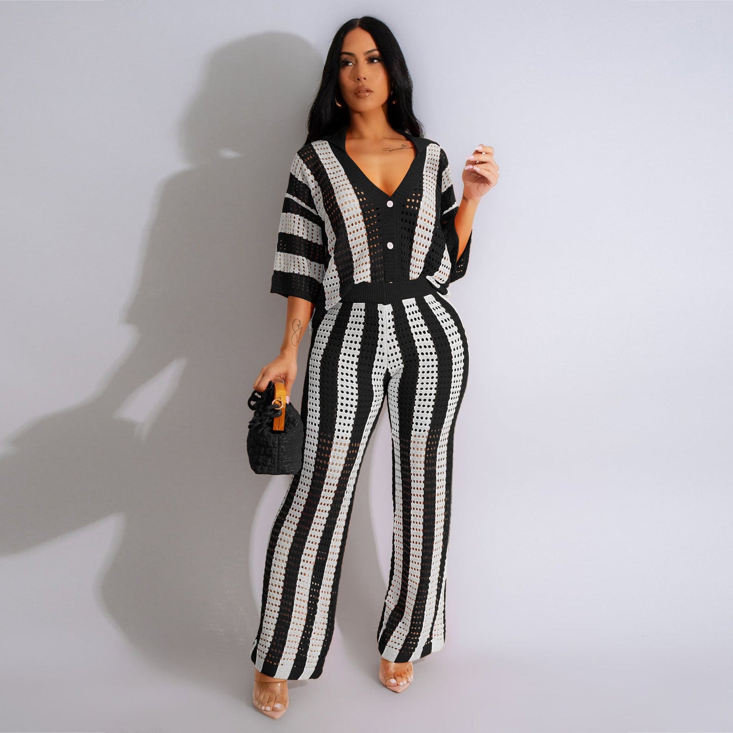 Conjunto de blusa y pantalones anchos de punto con cuello en V y rayas caladas para mujer