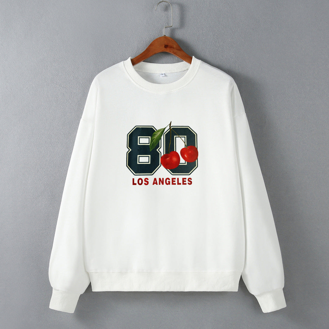 Sudadera holgada de manga larga con cuello redondo y hombros descubiertos para mujer, estilo hipster urbano, ropa informal para otoño e invierno.