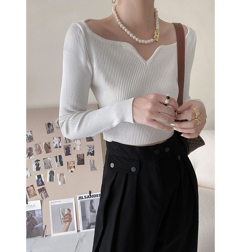 Suéter corto con cuello de pétalo para mujer, camisa de otoño ajustada con clavícula.