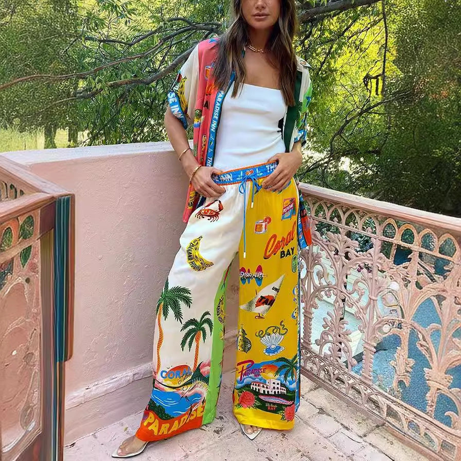 Traje informal de dos piezas con camisa y pantalones de cuello de manga corta de satén con estampado de grafiti