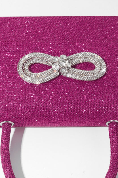 Bolso con asa de diamante y brillo metálico 