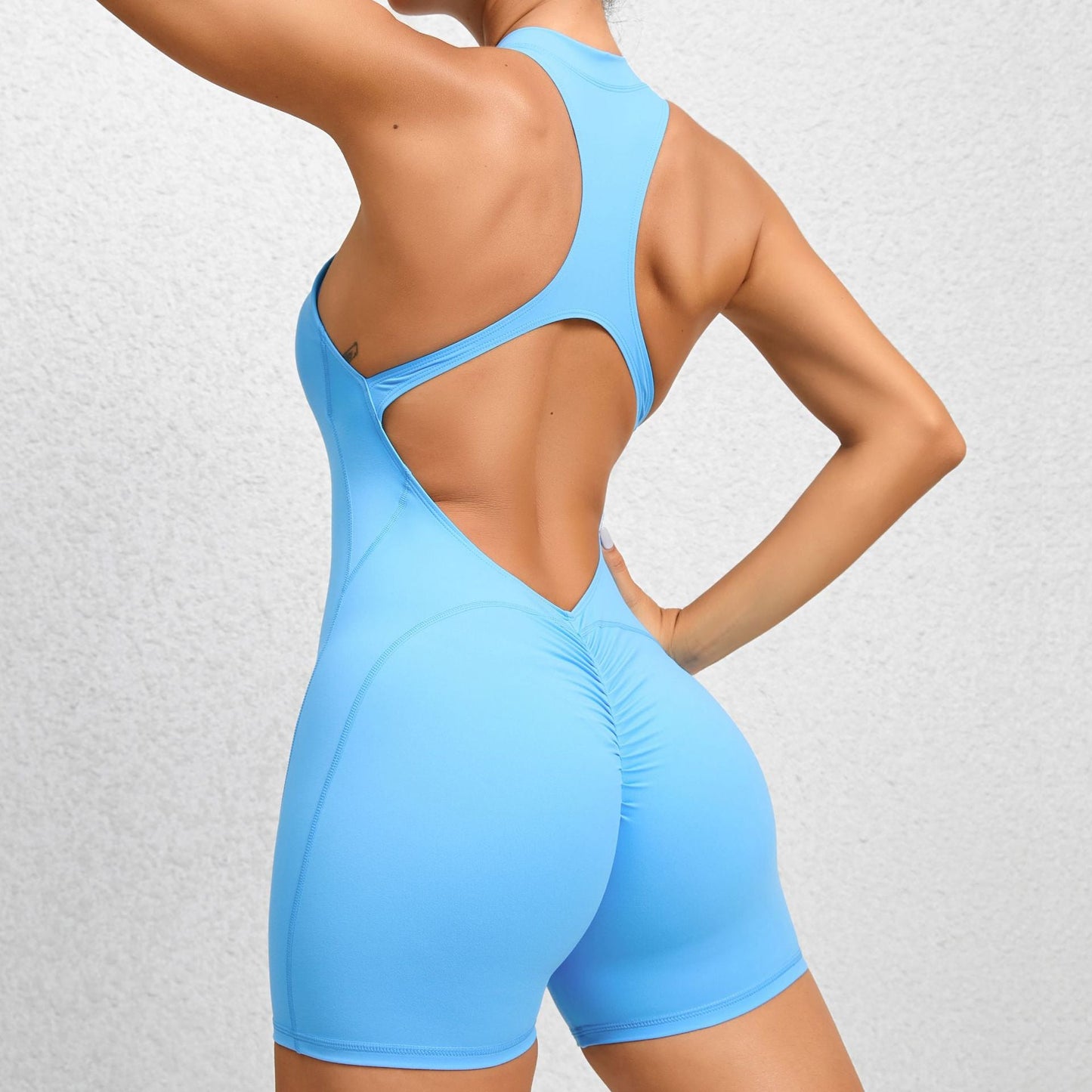 Pantalones de yoga deportivos ajustados con cremallera y tejido no tejido, color melocotón, de una pieza, de secado rápido, con pliegues para fitness