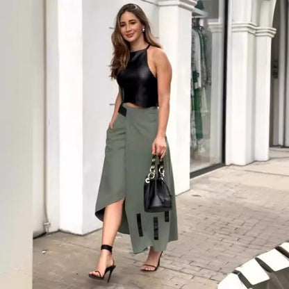 Traje de mujer sin mangas con cuello halter y top corto con falda asimétrica irregular de dos piezas