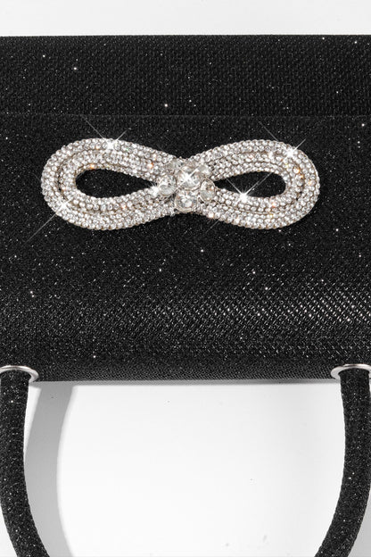 Bolso con asa de diamante y brillo metálico 