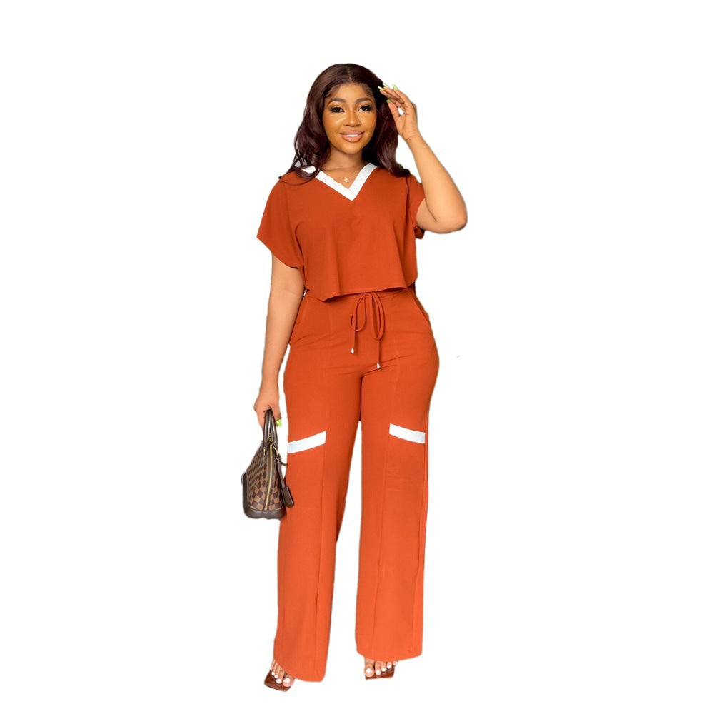Conjunto deportivo de dos piezas de camiseta de manga corta informal de color liso con pantalones de pierna recta para verano