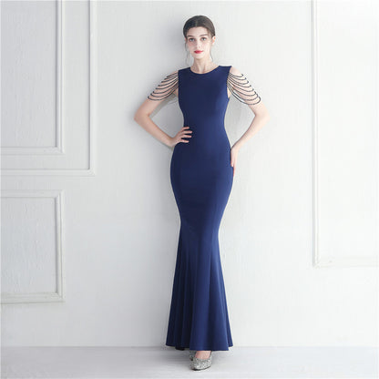 Vestido largo de cola de pez con cuentas para dama de honor invitada a la boda