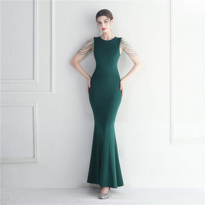 Vestido largo de cola de pez con cuentas para dama de honor invitada a la boda