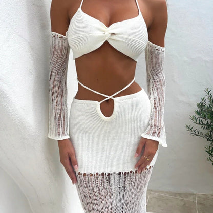 Conjunto de dos piezas formado por top y falda con abertura en la cadera, de punto, con cordón ajustable y mangas largas cruzadas en el pecho para primavera y verano