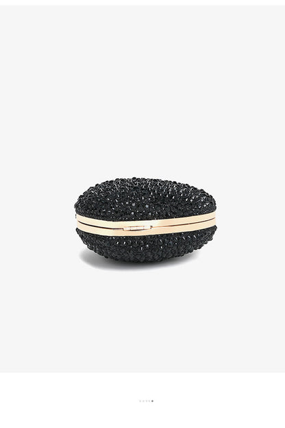 Cartera de mano con diamantes de imitación en forma de corazón 