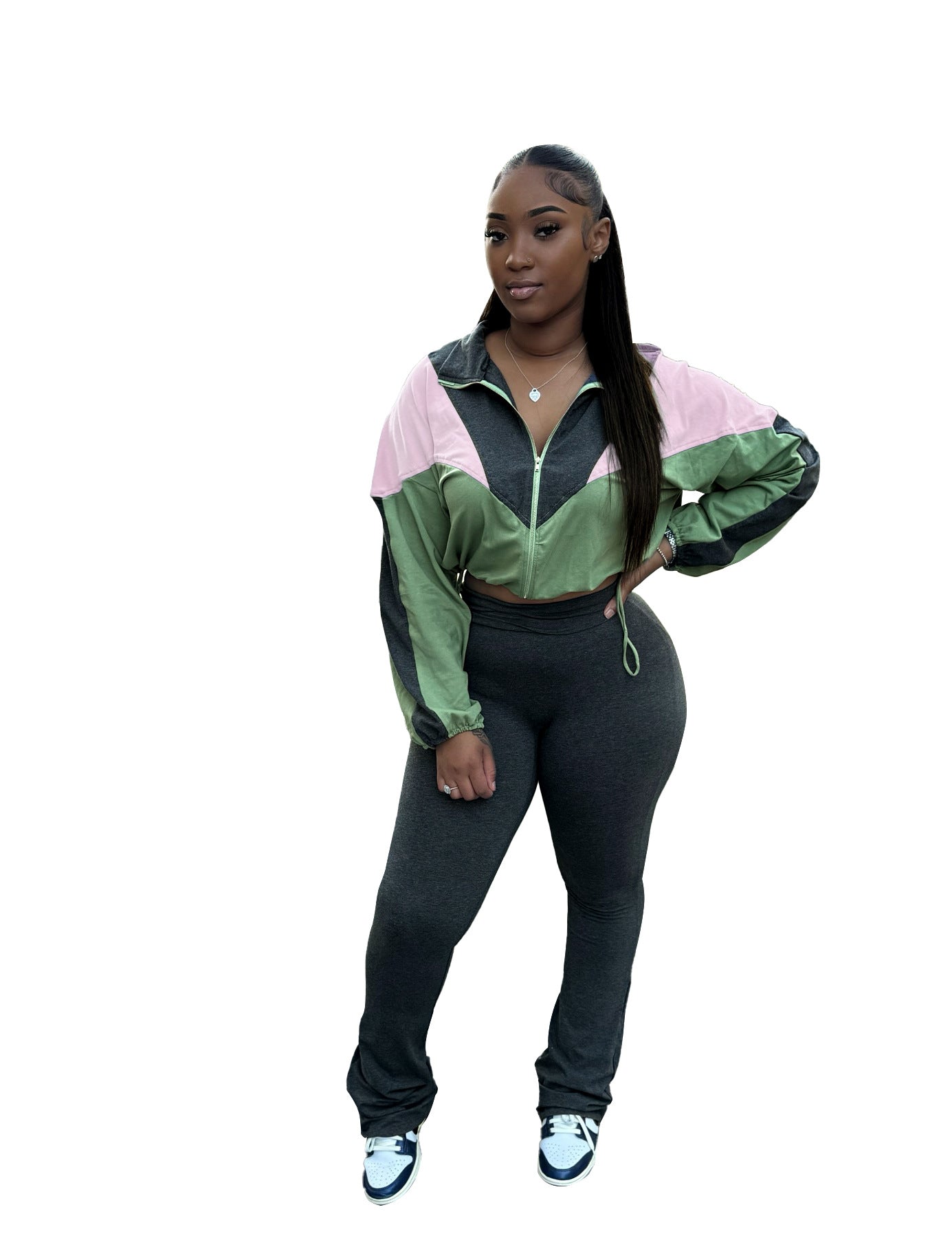 Conjunto deportivo informal de dos piezas para mujer, con cintura alta, corte acampanado y corte a juego.