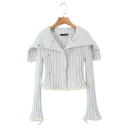 Conjunto de suéter de punto con cuello grande y cuerda hecha a mano en dos colores de otoño
